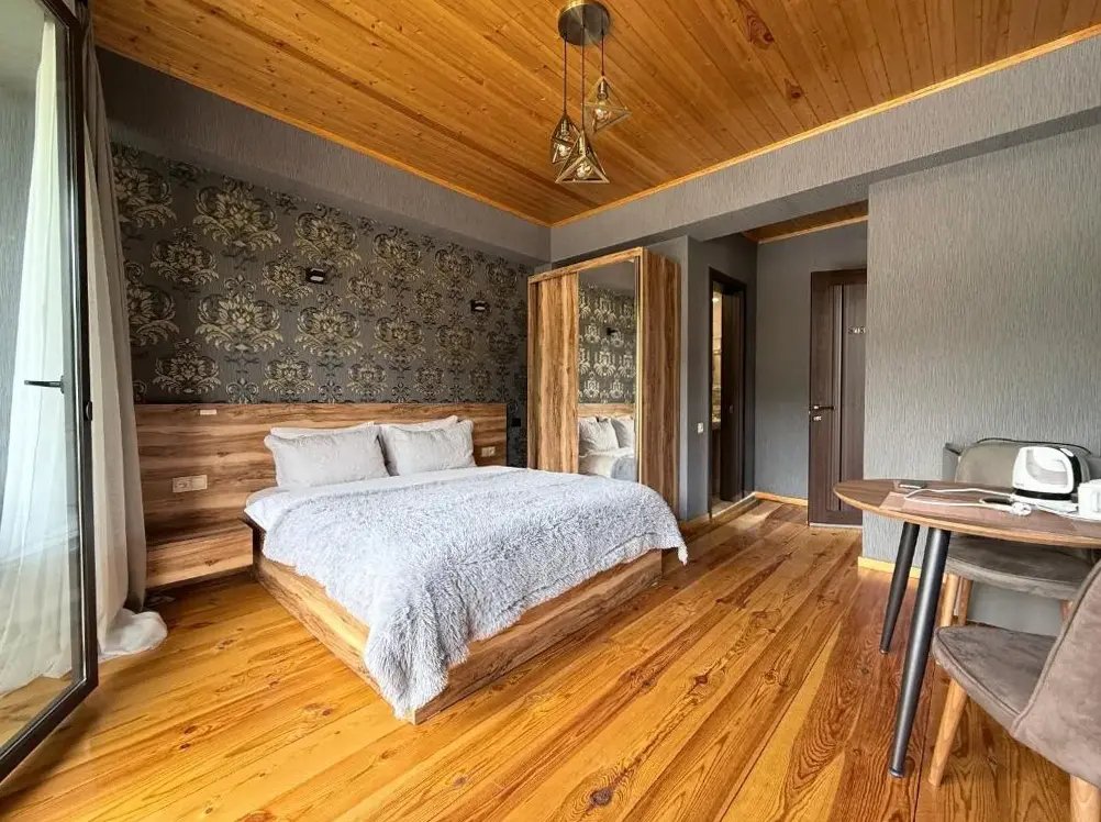 Best View Kazbegi hotel guest room with mountain views in Stepantsminda, Georgia