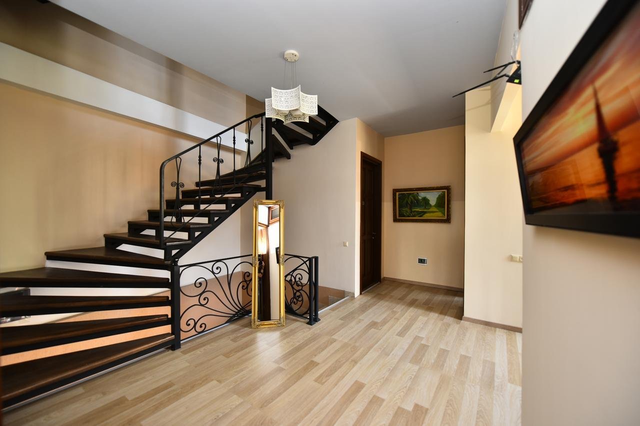Hotel Phaliashvili lobby and interior staircase with ornate railings, Batumi