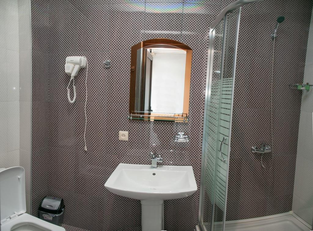 Hotel Phaliashvili bathroom with shower and modern fixtures, Batumi