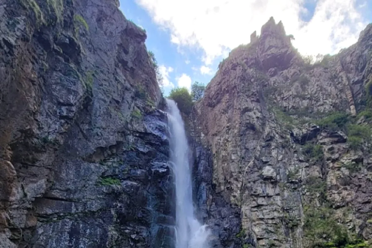 A waterfall in the narrow rocky gorge at Gveleti near Stepantsminda, Kazbegi, Georgia
