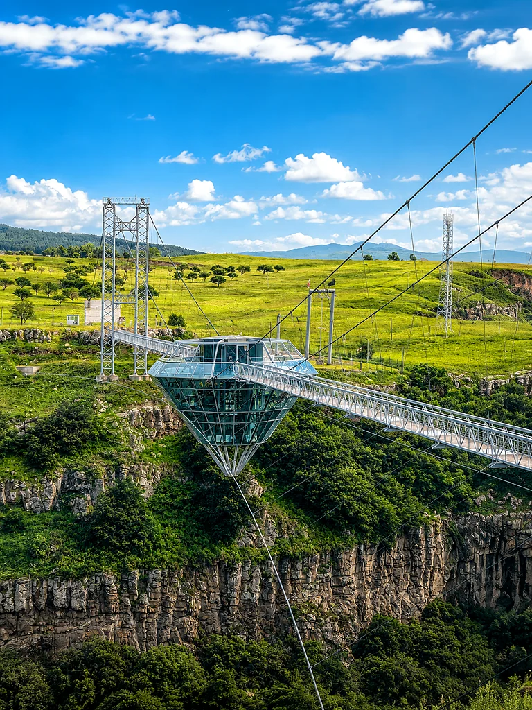 The diamond-shaped glass café suspended beneath the Diamond Bridge, Dashbashi Canyon, Georgia
